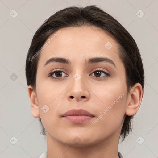 Neutral white young-adult female with medium  brown hair and brown eyes