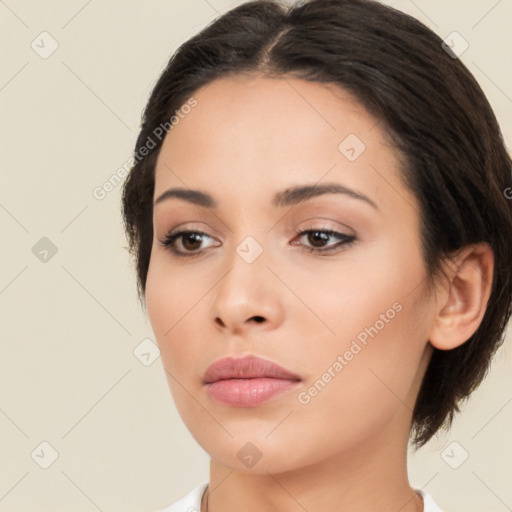 Neutral white young-adult female with medium  brown hair and brown eyes