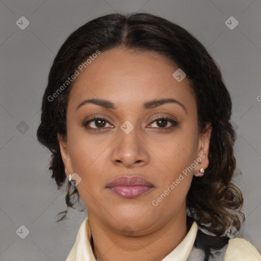 Joyful latino young-adult female with medium  brown hair and brown eyes