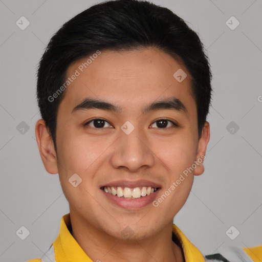 Joyful asian young-adult male with short  brown hair and brown eyes