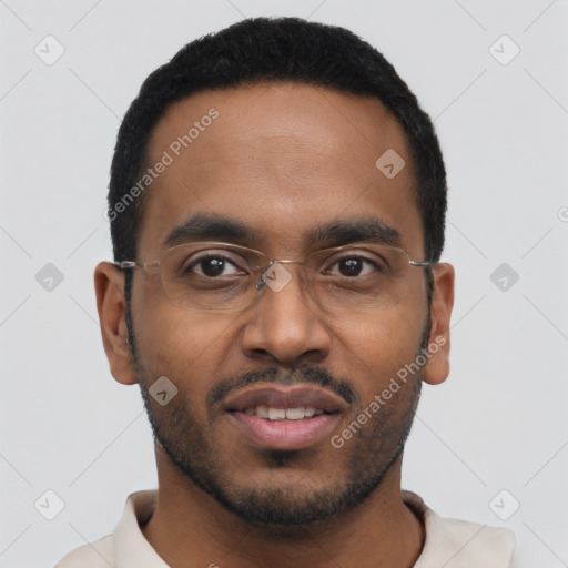 Joyful black young-adult male with short  black hair and brown eyes