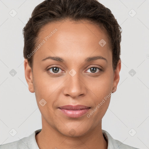 Joyful white young-adult female with short  brown hair and brown eyes