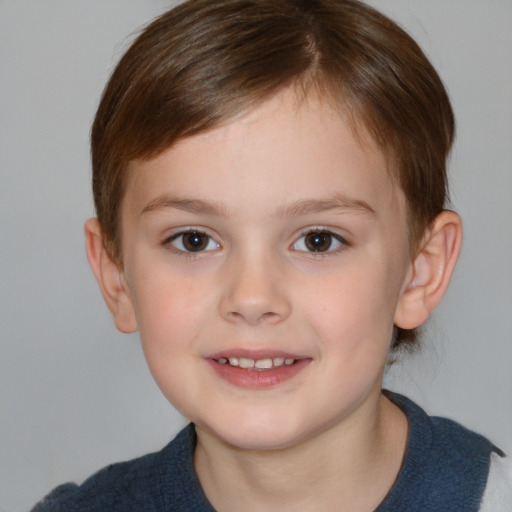 Joyful white child female with short  brown hair and brown eyes