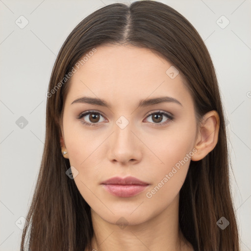 Neutral white young-adult female with long  brown hair and brown eyes