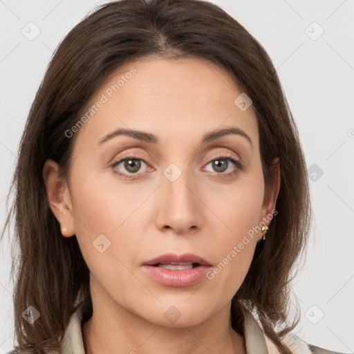 Neutral white young-adult female with medium  brown hair and grey eyes