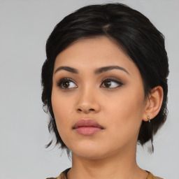 Neutral asian young-adult female with medium  black hair and brown eyes