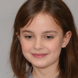 Joyful white child female with medium  brown hair and brown eyes