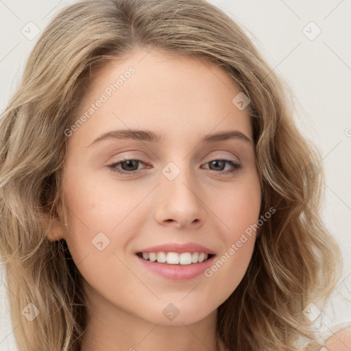 Joyful white young-adult female with long  brown hair and green eyes