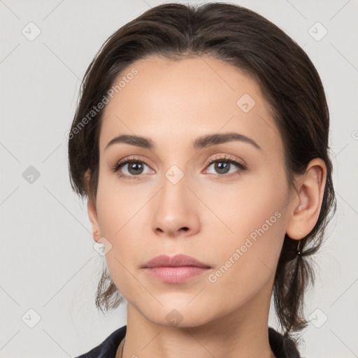 Neutral white young-adult female with medium  brown hair and brown eyes