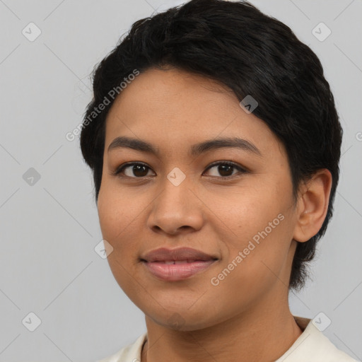 Joyful asian young-adult female with short  black hair and brown eyes