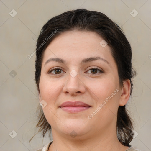 Joyful white young-adult female with medium  brown hair and brown eyes