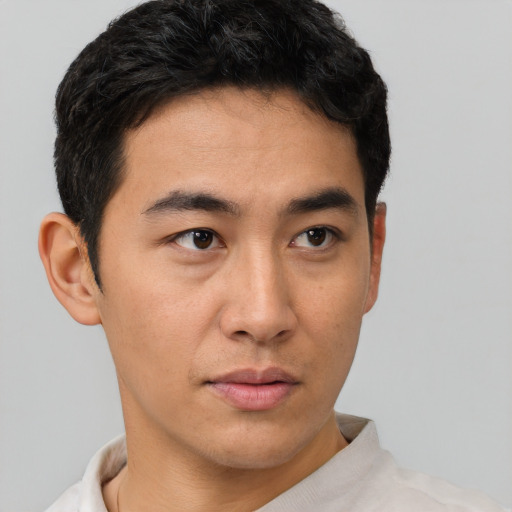 Neutral latino young-adult male with short  brown hair and brown eyes