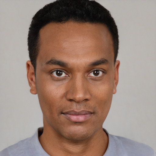 Neutral black young-adult male with short  black hair and brown eyes