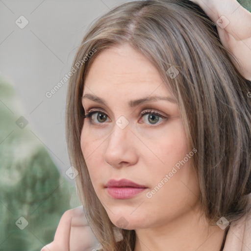 Neutral white young-adult female with medium  brown hair and brown eyes