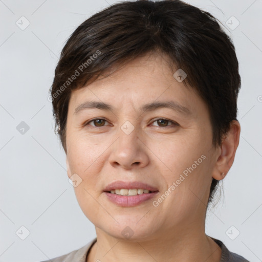 Joyful white young-adult female with short  brown hair and brown eyes