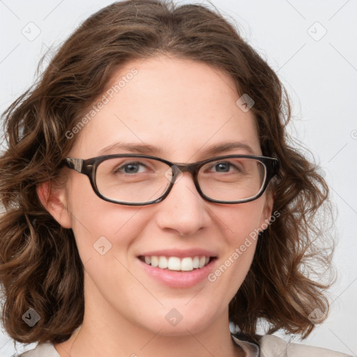 Joyful white young-adult female with medium  brown hair and green eyes