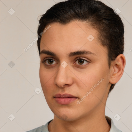 Joyful white young-adult female with short  brown hair and brown eyes