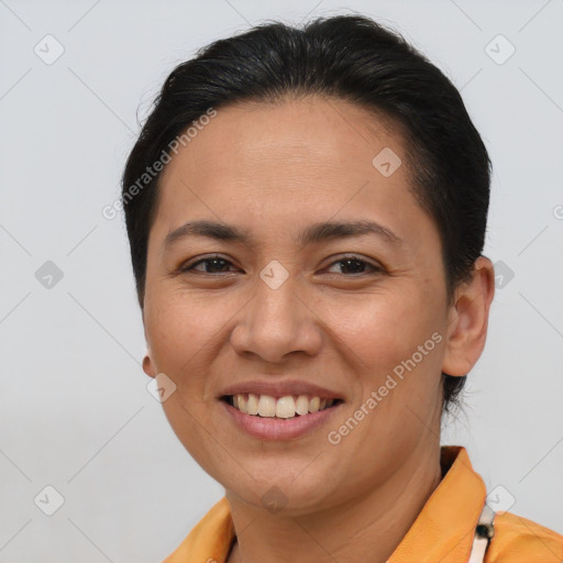 Joyful asian young-adult female with short  brown hair and brown eyes