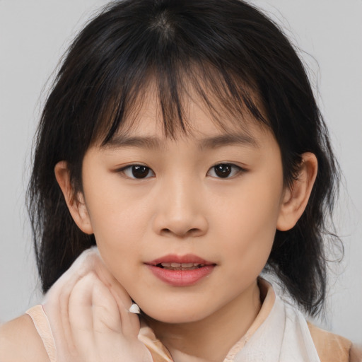 Neutral asian child female with medium  brown hair and brown eyes