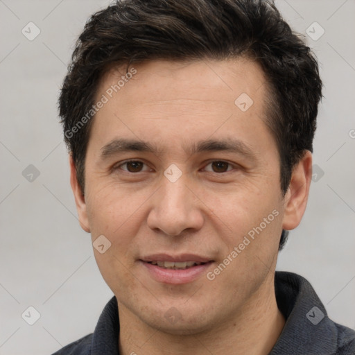 Joyful white adult male with short  brown hair and brown eyes