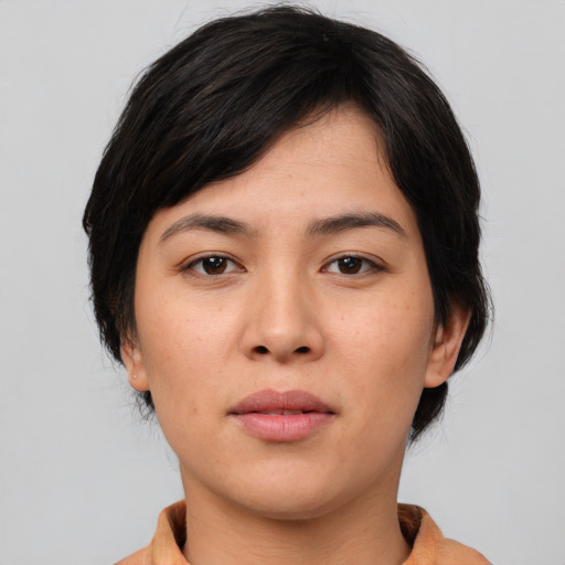 Neutral asian young-adult female with medium  black hair and brown eyes