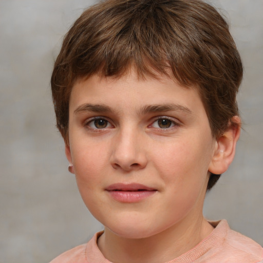 Joyful white child female with short  brown hair and brown eyes