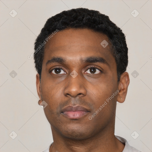 Neutral black young-adult male with short  black hair and brown eyes
