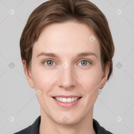 Joyful white young-adult female with short  brown hair and grey eyes