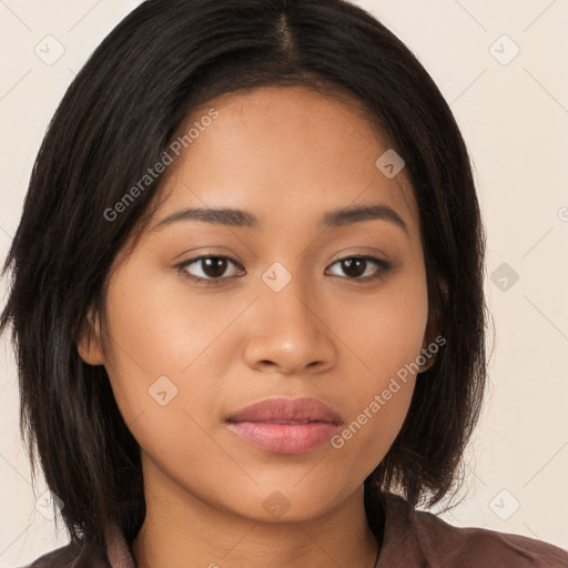 Neutral latino young-adult female with long  brown hair and brown eyes