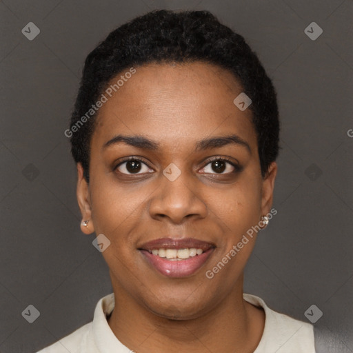 Joyful black young-adult female with short  black hair and brown eyes