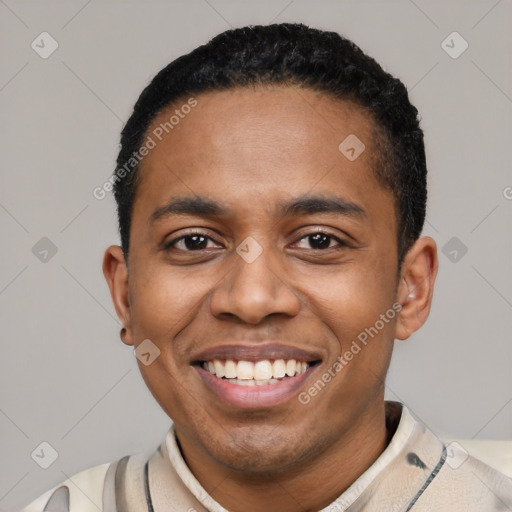 Joyful black young-adult male with short  black hair and brown eyes