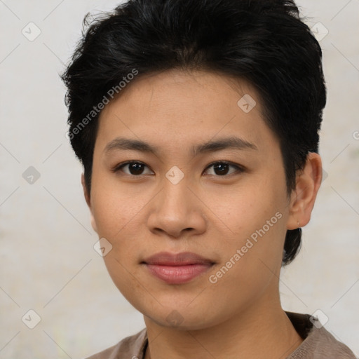 Joyful asian young-adult female with short  brown hair and brown eyes