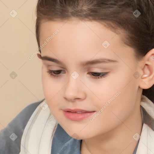 Joyful white child female with short  brown hair and brown eyes