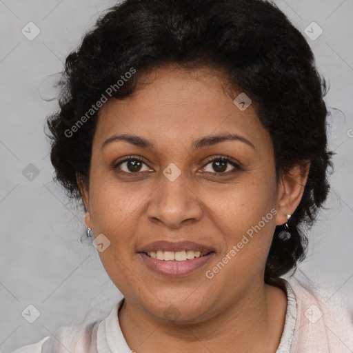 Joyful latino adult female with medium  brown hair and brown eyes