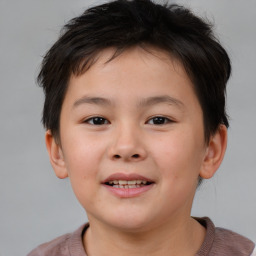 Joyful white child female with short  brown hair and brown eyes