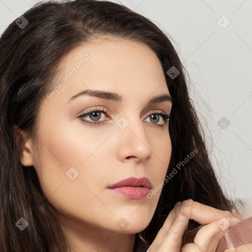 Neutral white young-adult female with long  brown hair and brown eyes