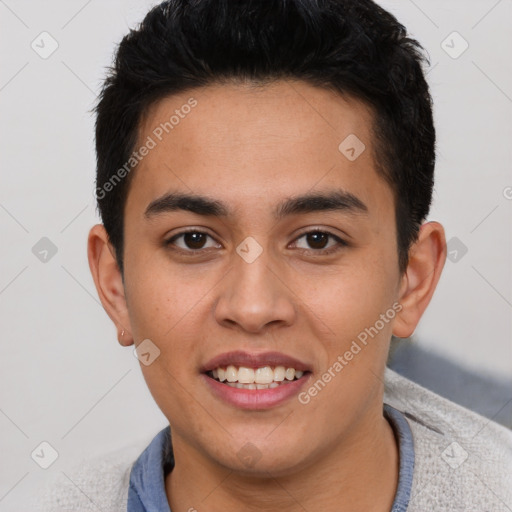 Joyful latino young-adult male with short  brown hair and brown eyes