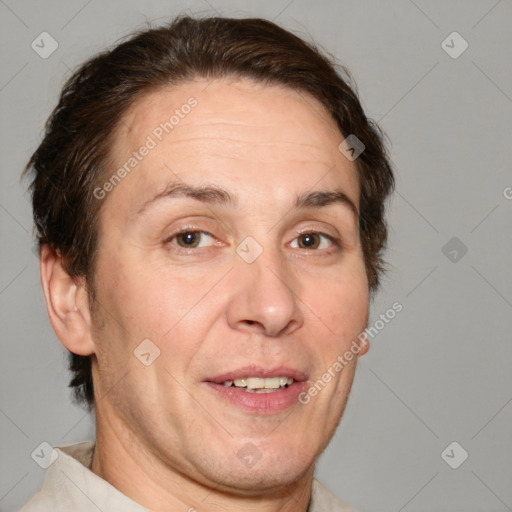 Joyful white adult female with short  brown hair and brown eyes