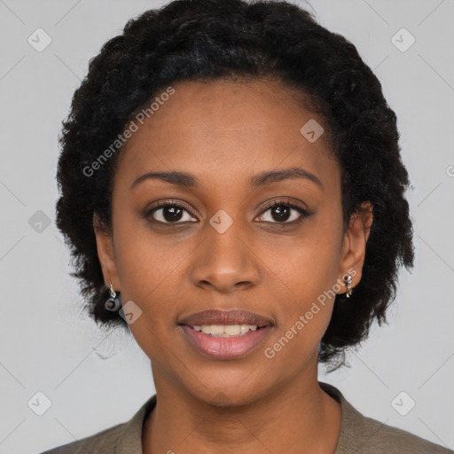 Joyful black young-adult female with long  black hair and brown eyes