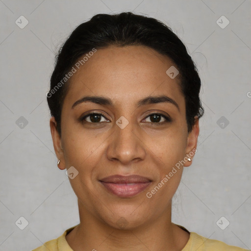 Joyful latino young-adult female with short  black hair and brown eyes