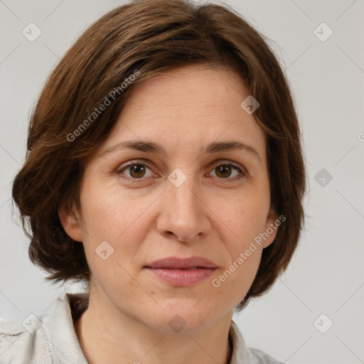 Joyful white adult female with medium  brown hair and grey eyes