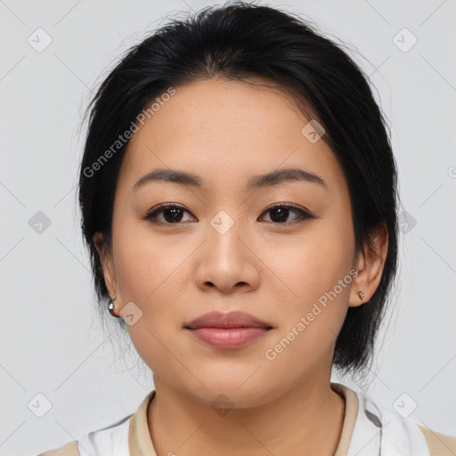 Joyful asian young-adult female with medium  black hair and brown eyes