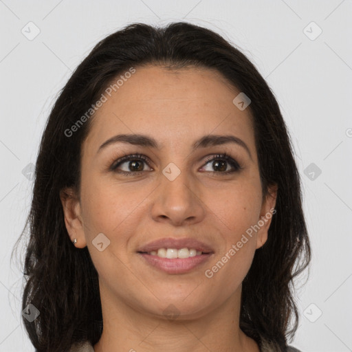 Joyful white young-adult female with long  brown hair and brown eyes