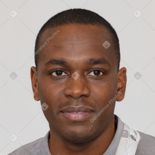 Neutral black young-adult male with short  brown hair and brown eyes