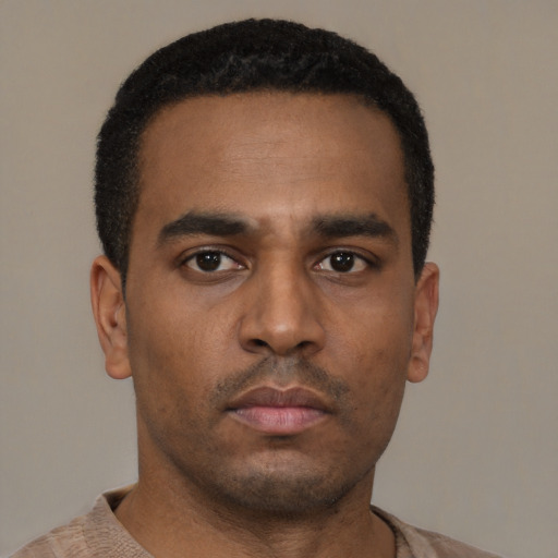Neutral latino young-adult male with short  brown hair and brown eyes
