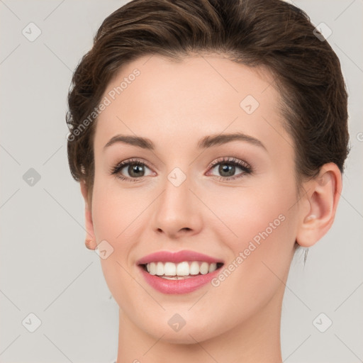 Joyful white young-adult female with medium  brown hair and green eyes