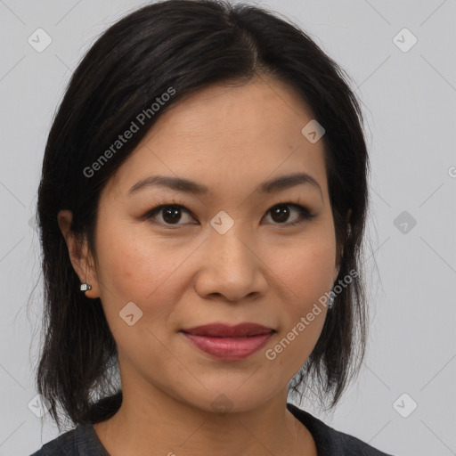 Joyful latino young-adult female with medium  brown hair and brown eyes