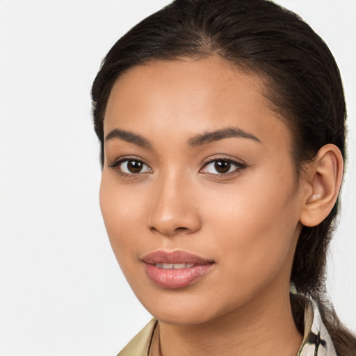 Joyful latino young-adult female with long  brown hair and brown eyes