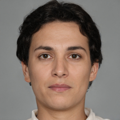 Neutral white young-adult female with short  brown hair and brown eyes