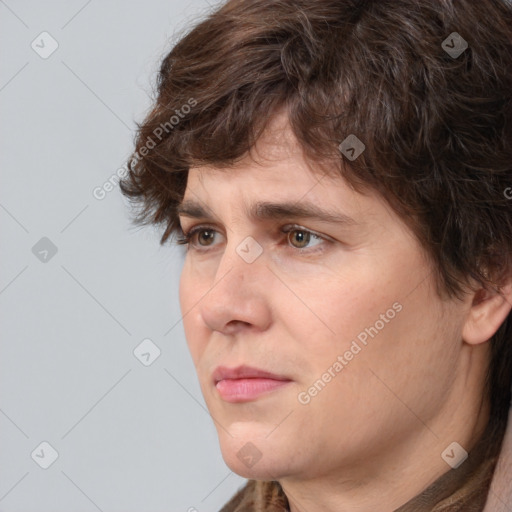 Neutral white young-adult male with medium  brown hair and brown eyes